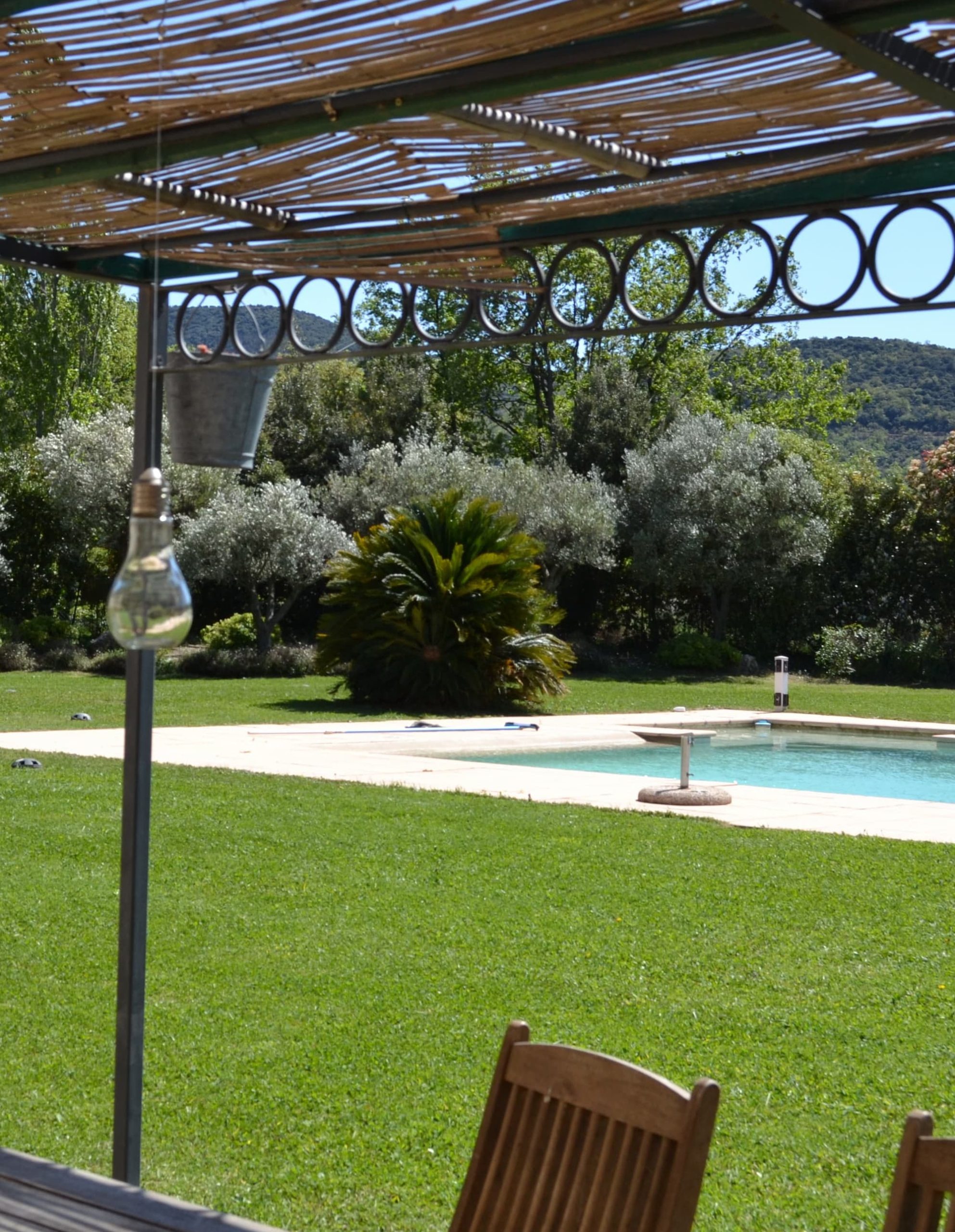 swimming pool and garden of the mas tramontane in saint michel de llotes in Roussillon Conflent in the Pyrénées Orientales